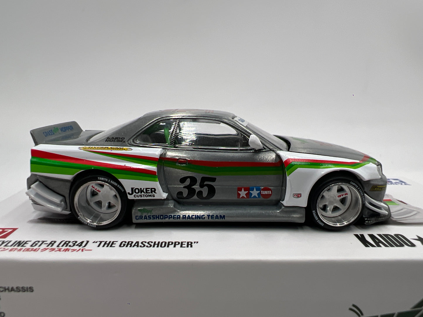 Mini GT Kaido House x Tamiya Collab #167 CHASE Nissan Skyline GT-R R34 The Grasshopper