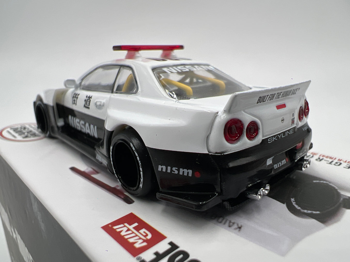 Mini GT x Kaido House #120 Nissan Skyline GT-R R34 Kaido Works V2 Aero Japan Police