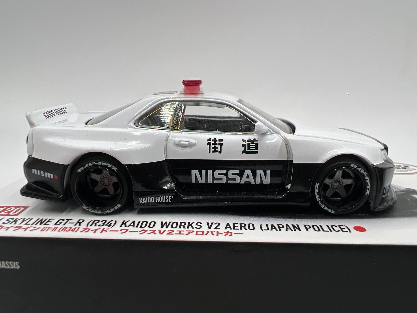 Mini GT x Kaido House #120 Nissan Skyline GT-R R34 Kaido Works V2 Aero Japan Police