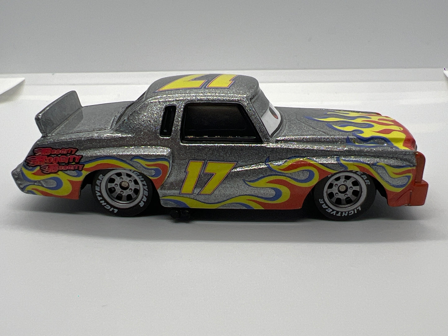 Disney Pixar Cars #17 Darrel Cartrip Silver/Flames Loose