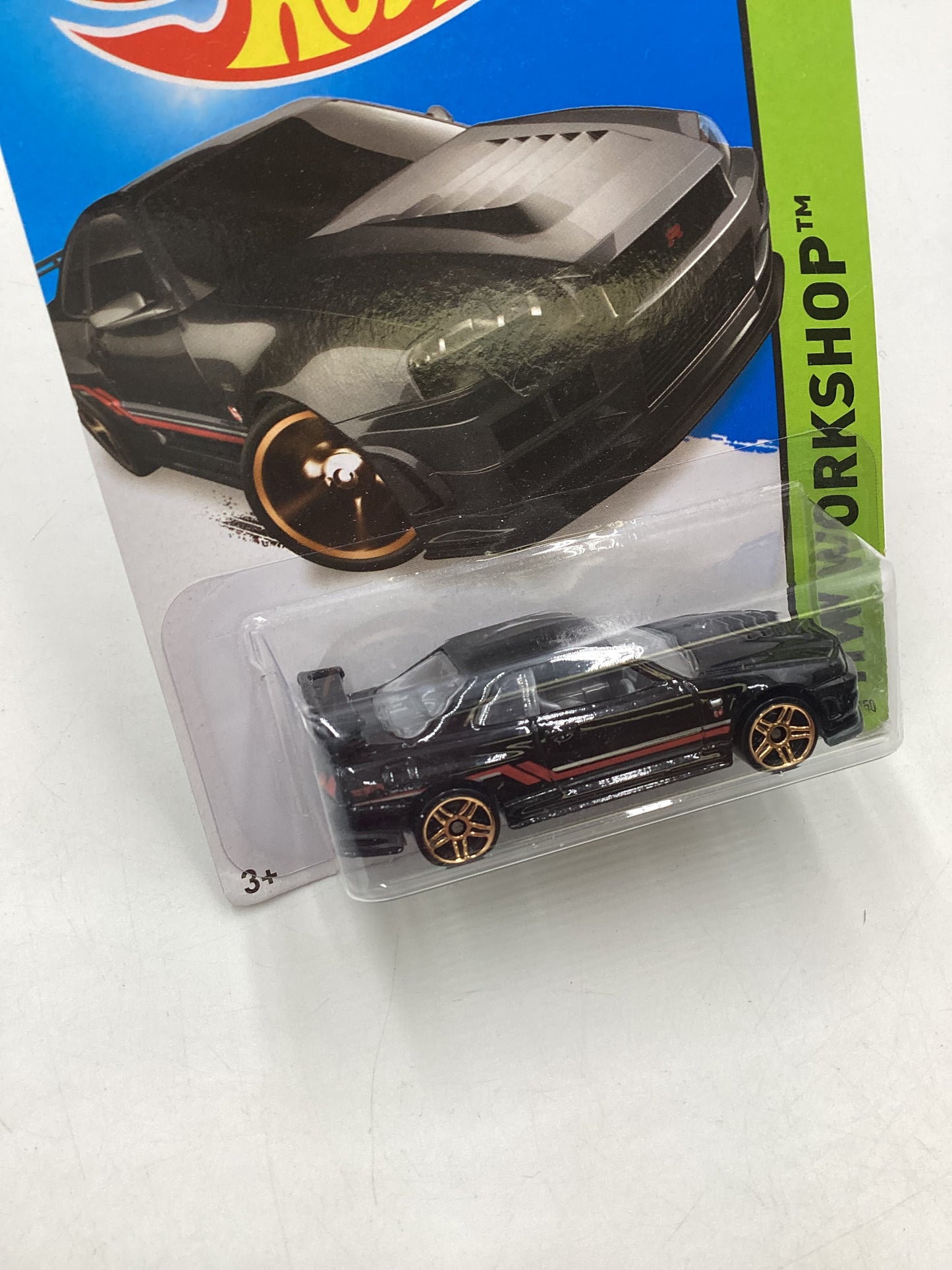 2014 Hot Wheels #230 Nissan Skyline GT-R (R34) Black with Protector