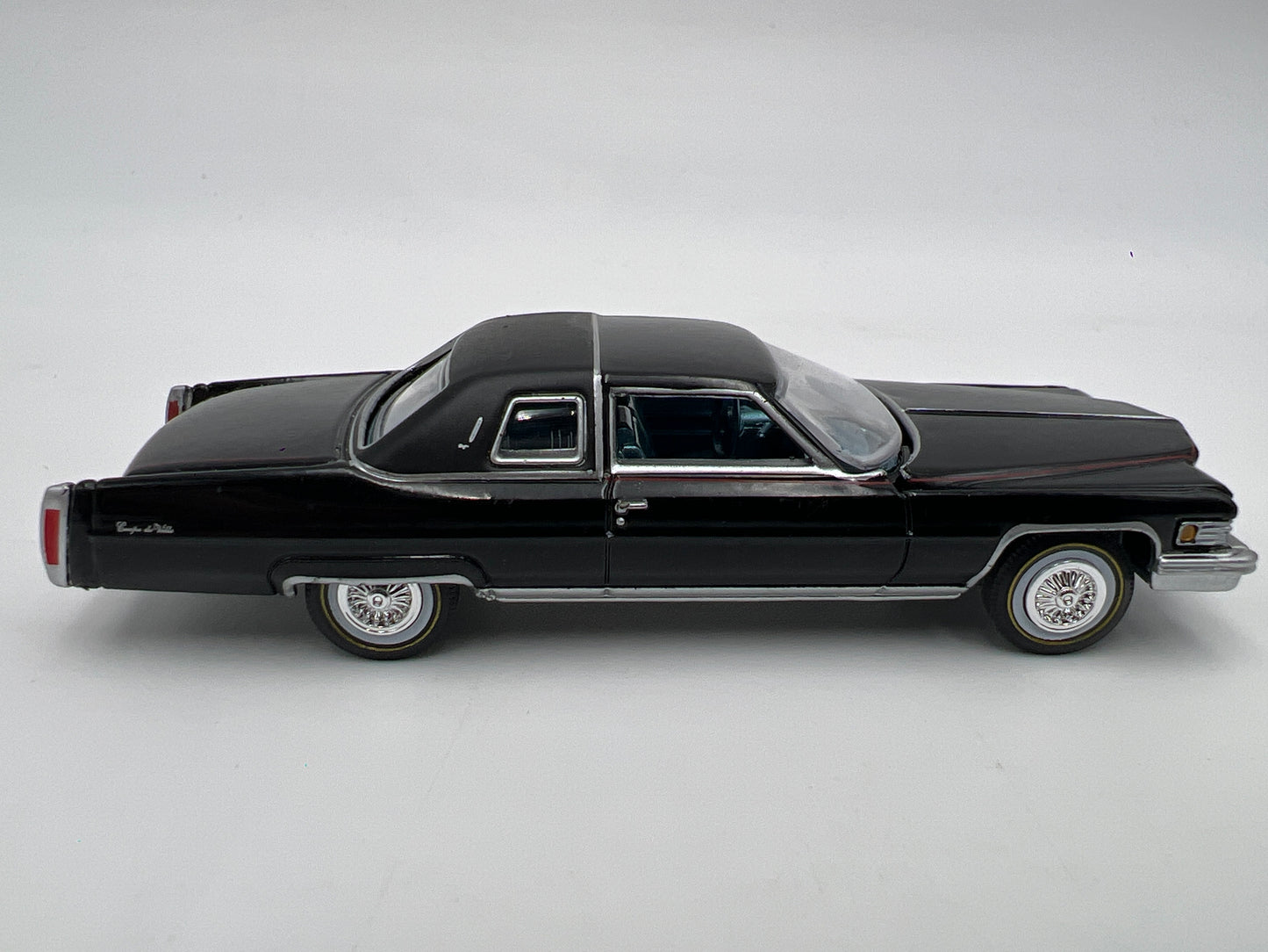Auto World 1/64 Land Yachts 1976 Cadillac Coupe DeVille Black Loose